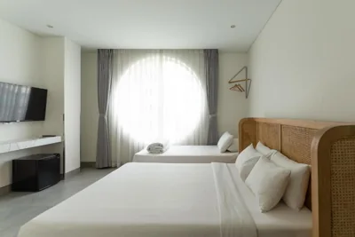 Dreibettzimmer mit Stadtblick — MEANDER Saigon
